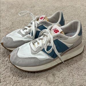 New Balance White and Blue Sneakers